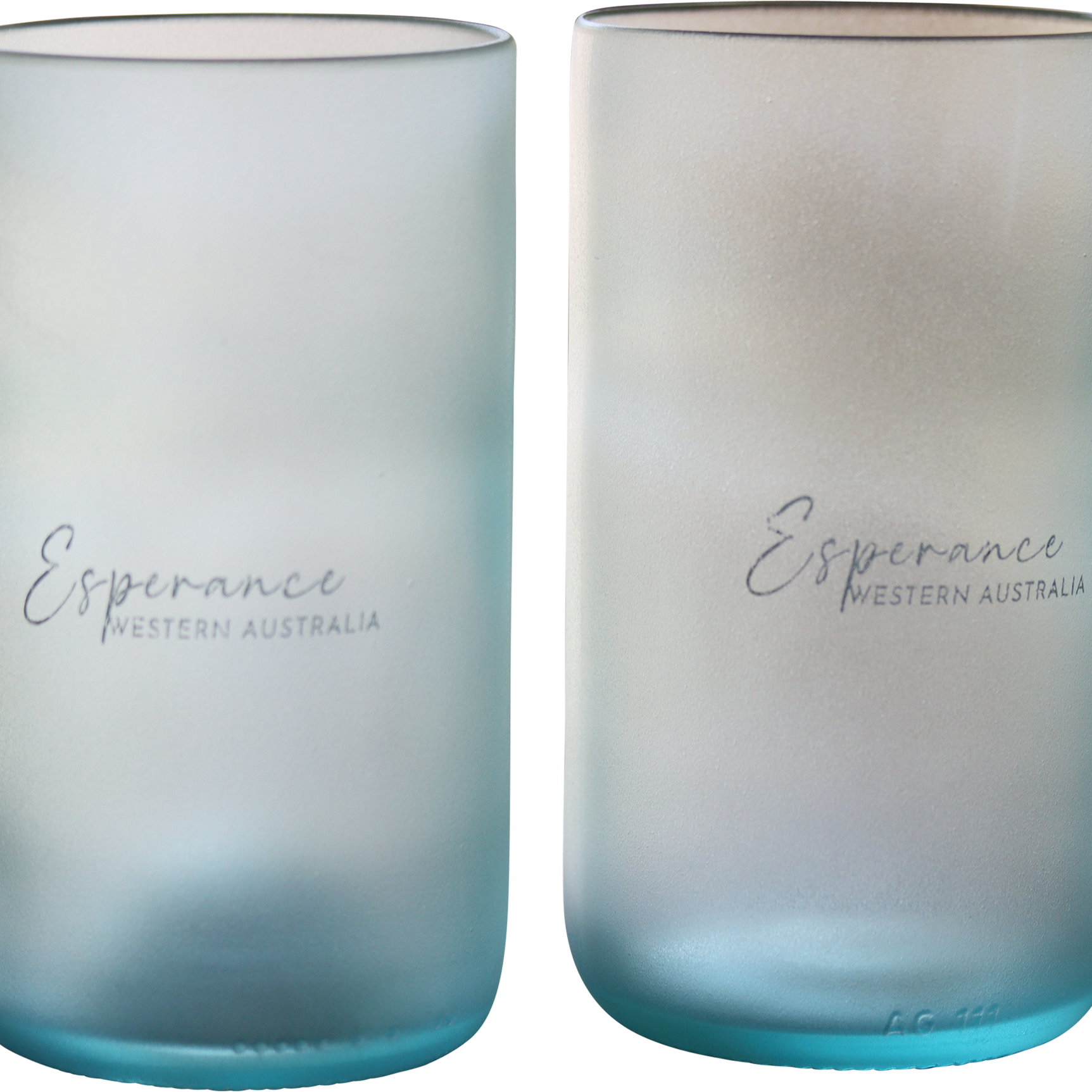 Close-up of the Shallow Water pint glass's texture and color, highlighting its sustainable origin and delicate hue