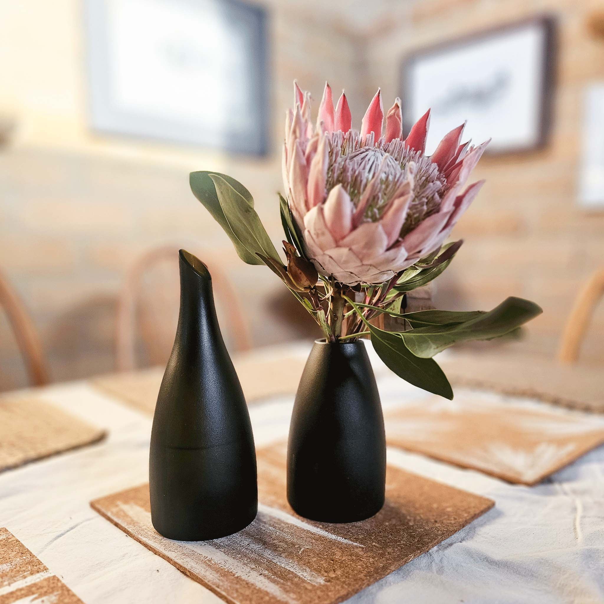 Its enigmatic, deep midnight, woodlands  tone coupled with the matte finish commands attention, defining the carafe as an exquisite complement to any aesthetic