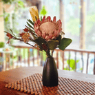 The Pr5estige vase a symbol of Versatile Elegance: Ideal for displaying fresh blooms or as a standalone sculpture that captivates.