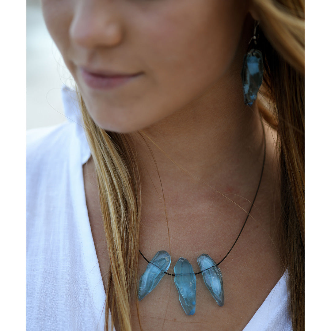 "Eco-chic ReValued Pendant Necklace worn, highlighting its versatile understated style and artisanal beauty."